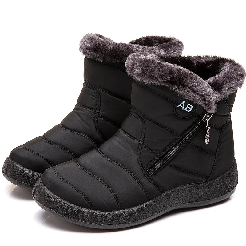 Boots Imperméable Femme noires avec doublure en fourrure grise, vue rapprochée sur le zip latéral et le haut rembourré.