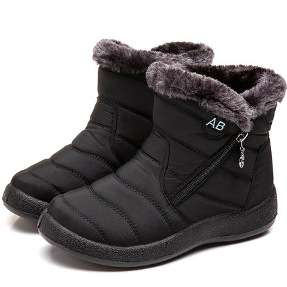 Boots Imperméable Femme noires avec doublure en fourrure grise, vue rapprochée sur le zip latéral et le haut rembourré.