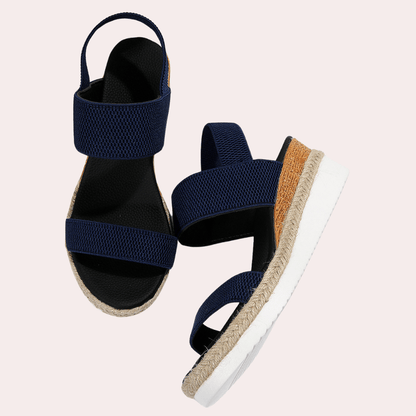 Abella - Sandales élégantes et confortables pour femmes – vue aérienne des sandales bleu marine avec semelle en jute et bride large.