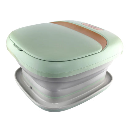 Bain de pied - Bassin pliable pour un massage relaxant des pieds – Seau de bain vert clair avec couvercle doré, vue de dessus sur fond blanc.