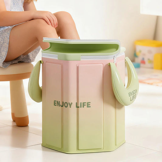 Bain de pied - Bassin pliable portable pour pédicure à domicile, vue de face avec design en dégradé de couleurs vert et rose, poignées visibles.