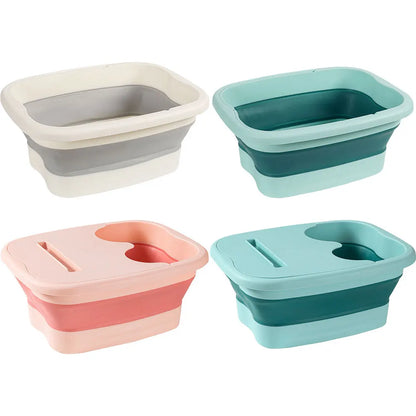 Bain de pied pliable en plastique durable, disponible en plusieurs couleurs, vue générale sur un fond neutre.