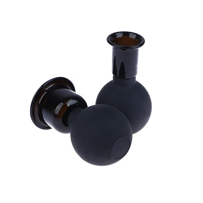 Lot de 4 ventouses anti-cellulites noires en silicone, vue rapprochée montrant les détails des ventouses avec finition lisse et design ergonomique.