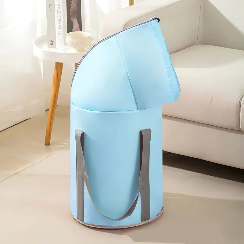 Bain de pied - Bassin portable pliable de couleur bleu avec poignées grises, vue générale sur un fond clair.