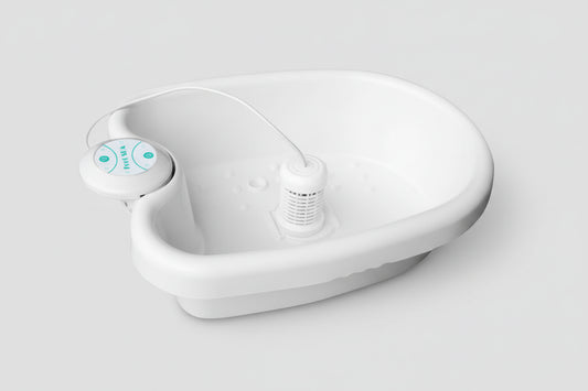 Bain de pied - Spa relaxant avec vibrations et ionisation – bassin blanc en plastique avec un dispositif de contrôle et un fond texturé pour massage