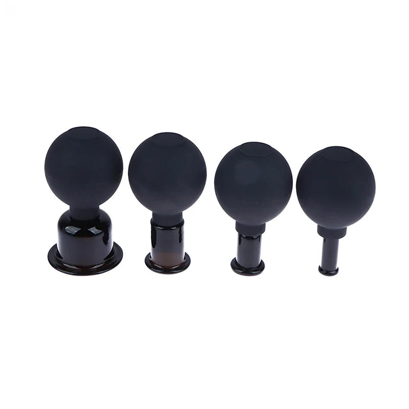 Lot de 4 ventouses anti-cellulites noires en silicone, vue de face montrant les différentes tailles et la finition lisse.