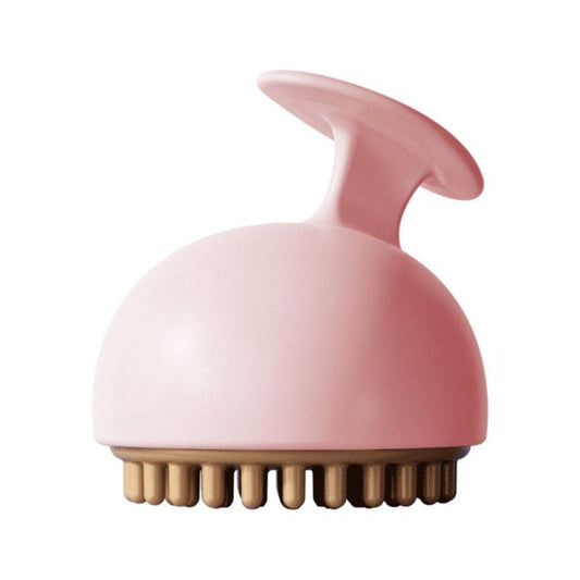 Brosse de massage anti-cellulite manuelle en silicone rose avec picots dorés, vue de côté mettant en avant sa forme ergonomique.