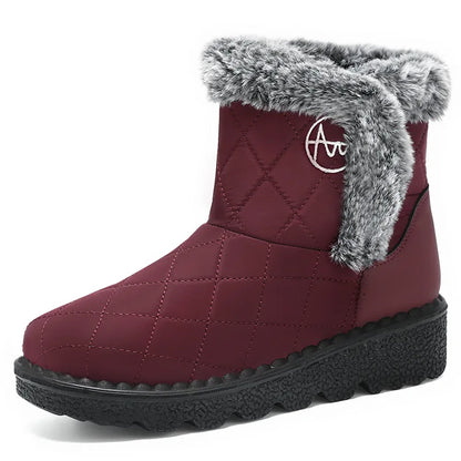 Bottines d'Hiver Femme couleur bordeaux avec fourrure grise, vue de côté, design matelassé et semelle épaisse.