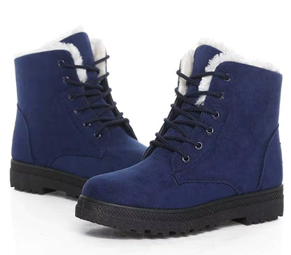 Bottines à Lacets Femme en cuir synthétique bleu avec intérieur en fourrure blanche, semelle antidérapante et lacets visibles.