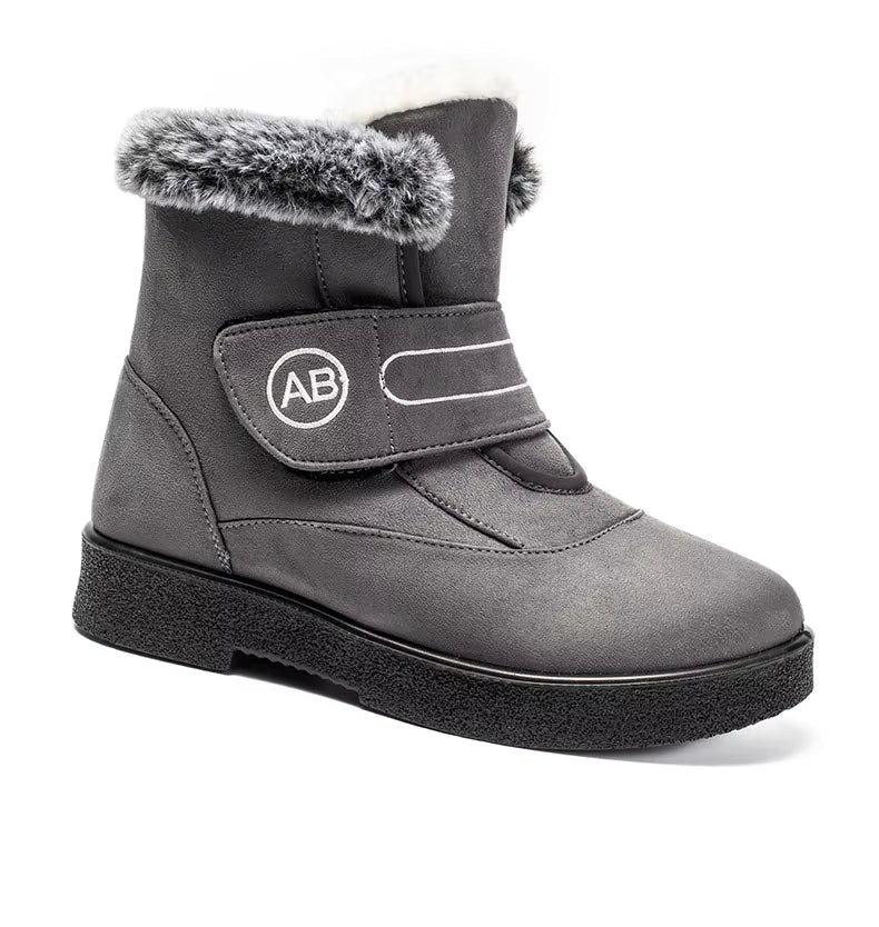 Bottines Femmes - Modèle AB en cuir gris avec fourrure synthétique, vue de face, semelle antidérapante et fermeture velcro.