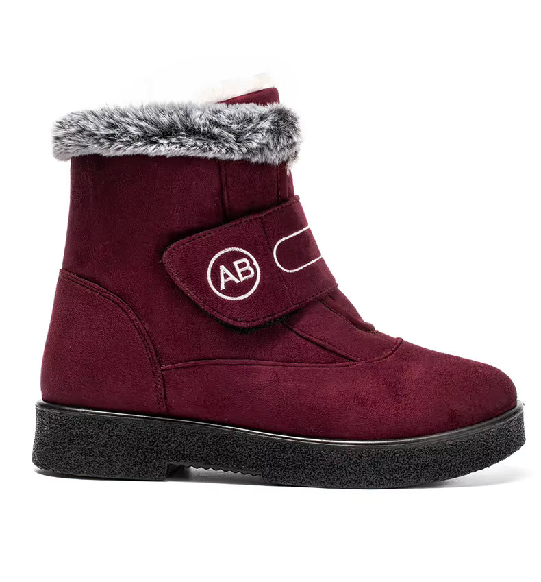Bottines Femmes - Modèle AB en velours bordeaux avec fourrure grise, vue latérale, semelle antidérapante visible.