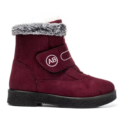 Bottines Femmes - Modèle AB en velours bordeaux avec fourrure grise, vue latérale, semelle antidérapante visible.