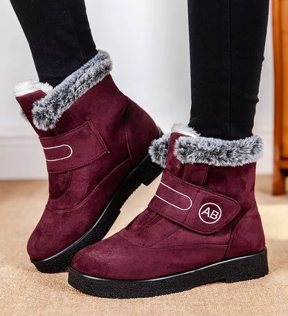 Bottines Femmes - Modèle AB en velours bordeaux avec fourrure grise, vue de face, semelle antidérapante visible.