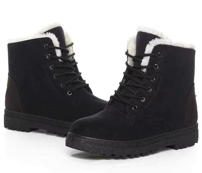 Bottines à Lacets Femme en cuir noir avec doublure en fausse fourrure, vue latérale montrant les lacets et la semelle antidérapante.