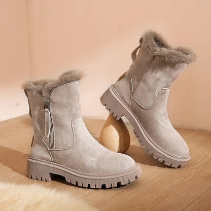 Bottes de Neige Femme grises, fourrées avec col en fourrure, fermeture éclair latérale et semelle crantée, idéales pour le confort en hiver.