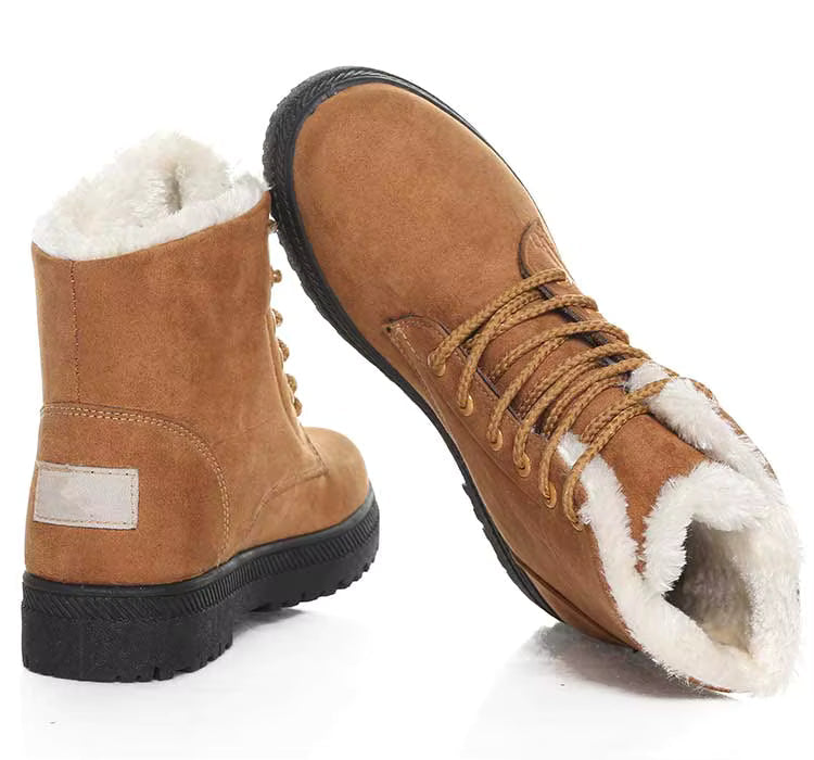Bottines à Lacets Femme en cuir synthétique camel avec intérieur en fourrure, semelle antidérapante et lacets visibles, vue de côté.