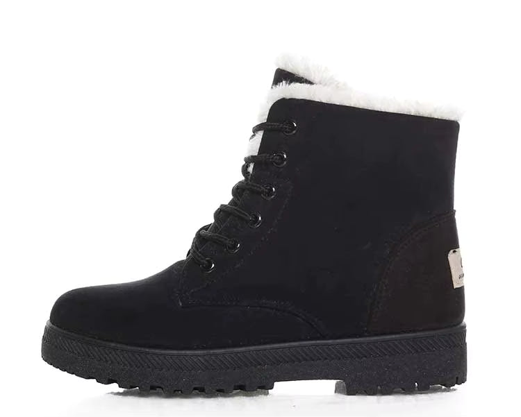 Bottines à Lacets Femme en cuir noir avec doublure en fausse fourrure, vue latérale mettant en avant les lacets et la semelle antidérapante.